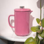 Pink cafetiere on shelf 1