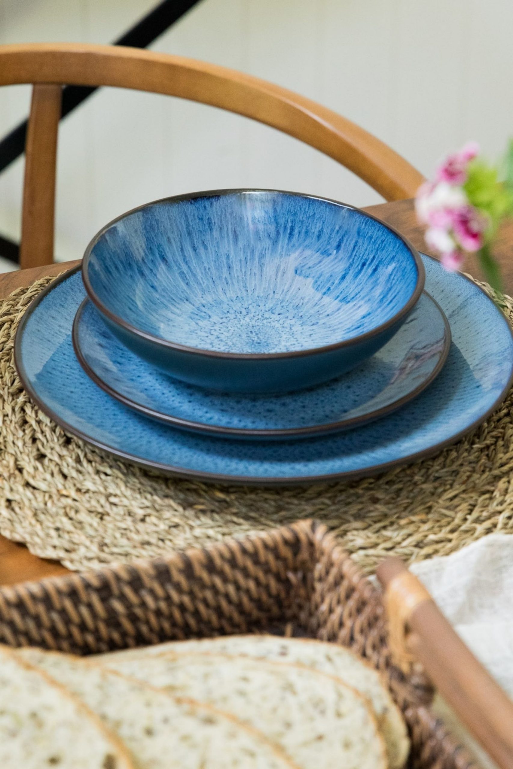 Kitchen Gifts They Will Actually Use: A Christmas Gift Guide | Upper Street Home Havn blue reactive glaze plates and bowl laid on a dining table