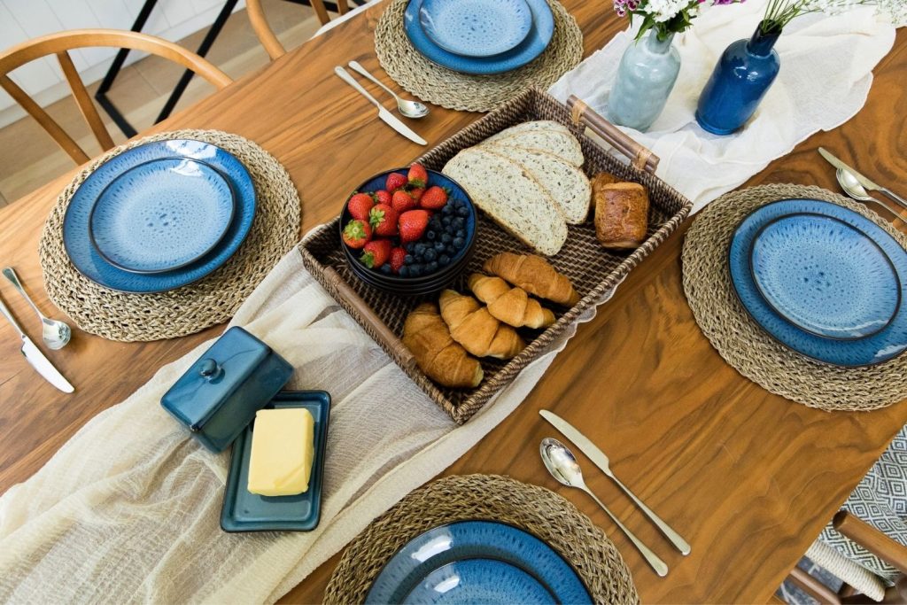 Autumn table laid with Havn blue reactive glaze tableware