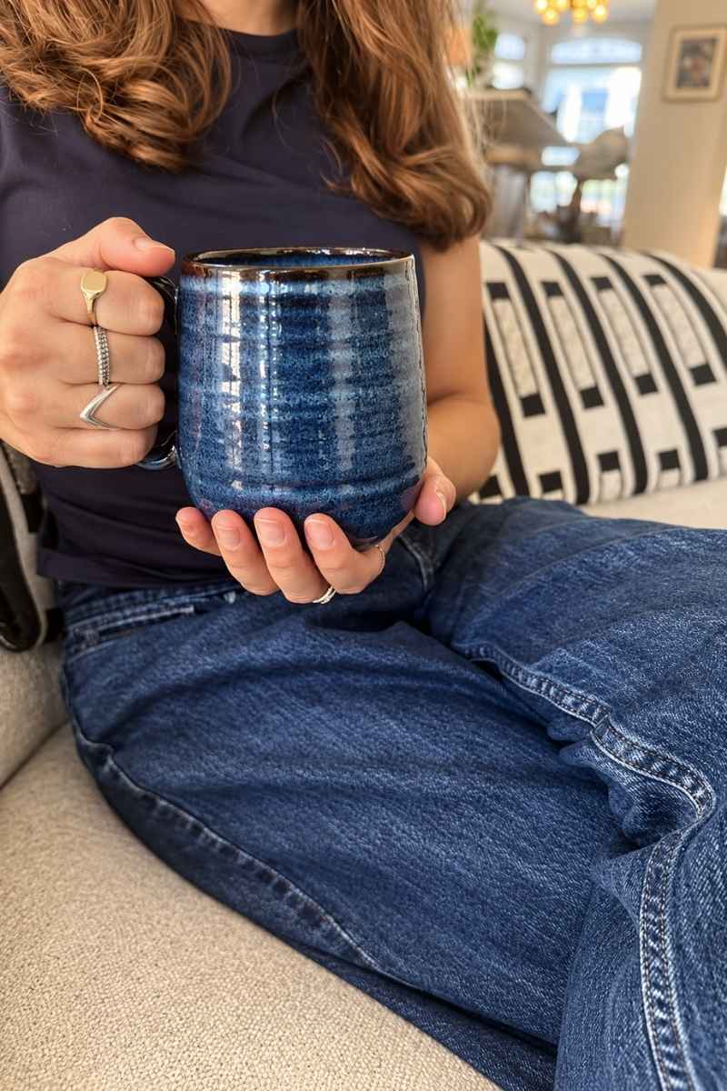 Kitchen Gifts They Will Actually Use: A Christmas Gift Guide | Upper Street Home Navy Aska reactive glaze mug held in two hands